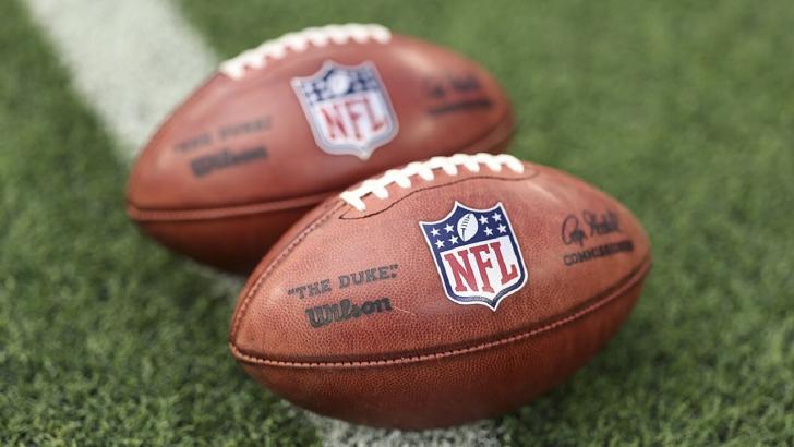 NFL footballs on show before a game